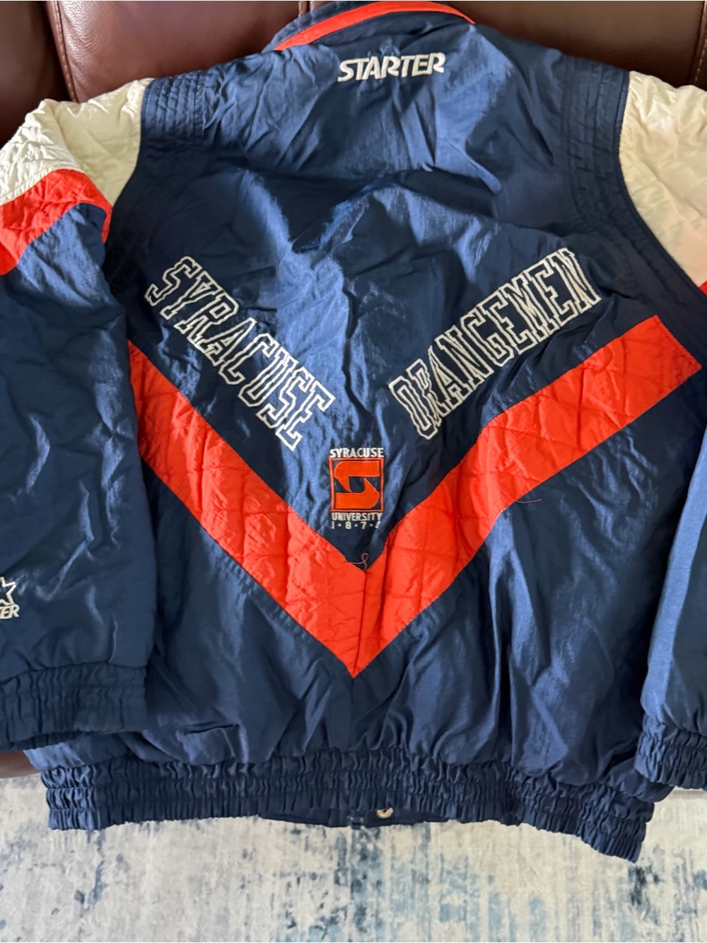 STARTER Navy and Orange Syracuse Puff Jacket